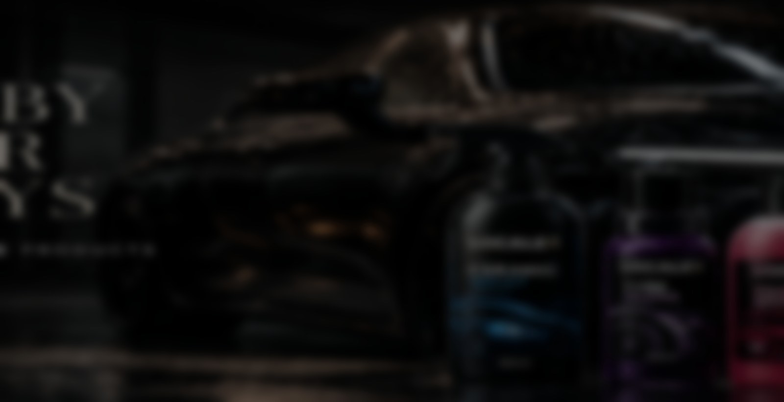 Automotive care products in a dark studio setting